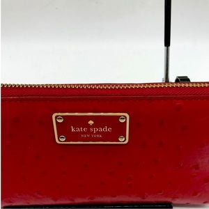 Kate spade ostrich red leather wallet, gold hardware and brass zipper
